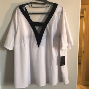 Eloqui white blouse with black trim. Size 18